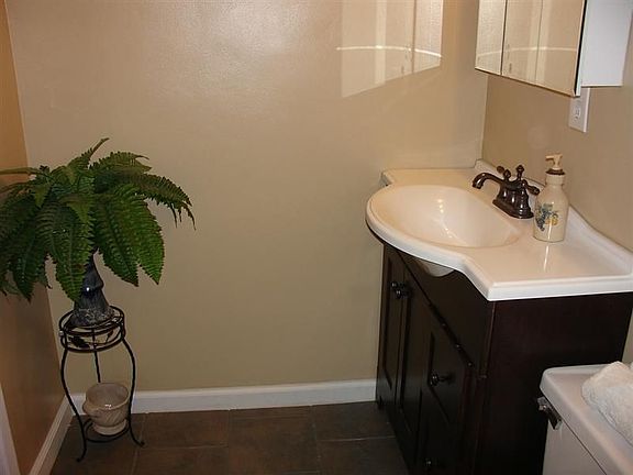 One of 2 Baths upgraded sinks and cabinets