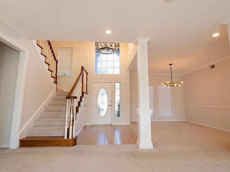 Opening into Dining area and leading into Formal Living Room