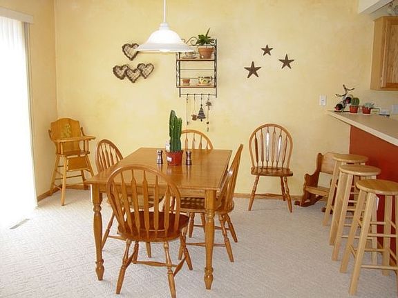 Dining with sliding doors to patio