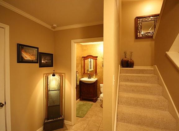 entry, powder room, stairs