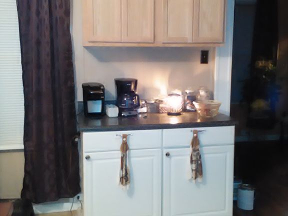 added cabinets over bar