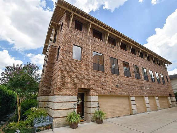 Beautiful elevation on the quiet 3 unit gated complex in the heart of Montrose. Three car garage plus room for additional car or
