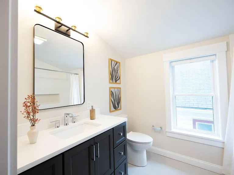Clean design meets cozy comfort! Get inspired by the details that bring this bathroom to life!