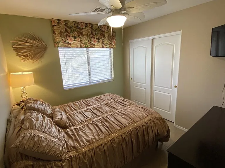 3rd Bedroom also has QUEEN and great VIEW of the backyard plus another TV! Ceiling fans in all bedrooms and livingroom!