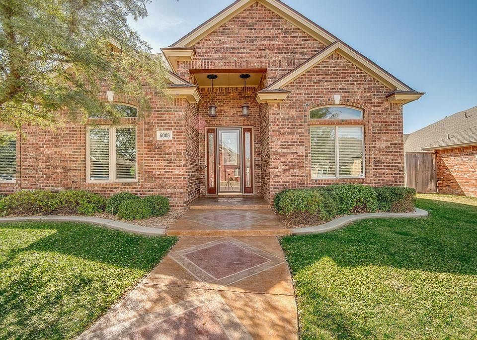 Front with decorative sidewalk