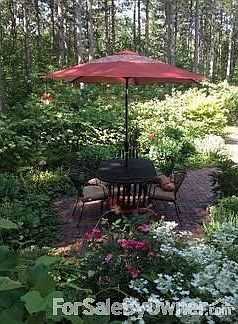 Patio and Garden
						:
						Gardens Around the whole property and Also Dog Run in rear of house.