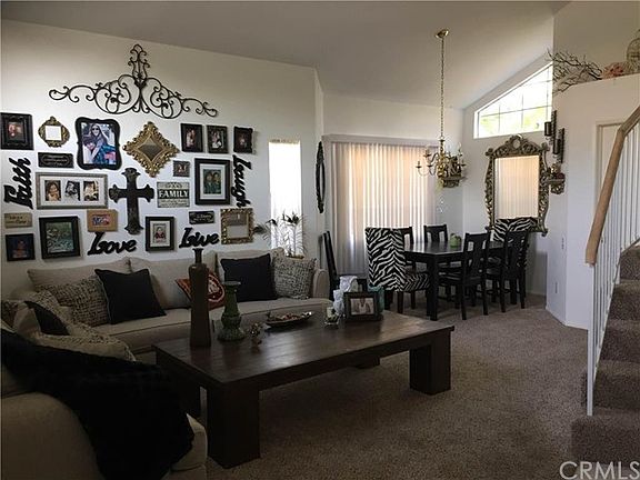 Living Room & Dining Area with Cathedral Ceiling