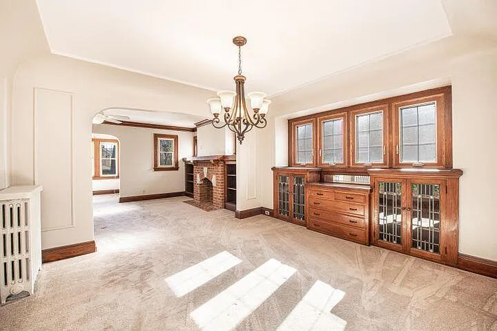 Dining Room w/ Stunning Buffet - Photos are of the upper unit but lower unit is being rented. Finishes and layout are the same.