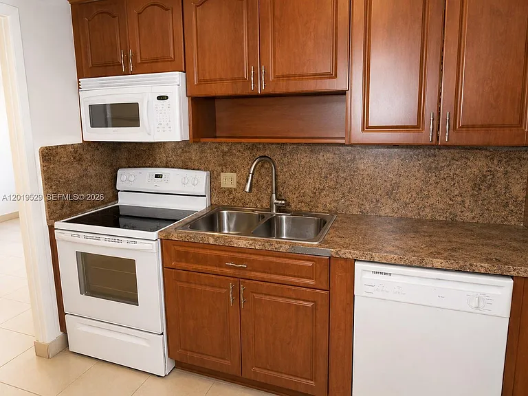 447 NE 195th St #117 — Photo 9