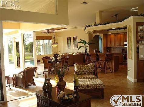 In door - Out door living with Zero Corner Sliders out to the pool, outdoor kitchen and lounging areas.