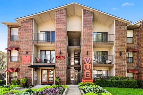 Apartment Exterior with Balcony View - Vue at Knoll Trail Apartments