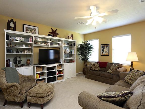 Living room opens to kitchen and study