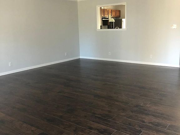 Living room, dining room, and reading nook
