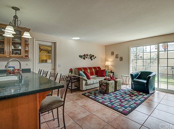 Open living area for gathering around the kitchen.