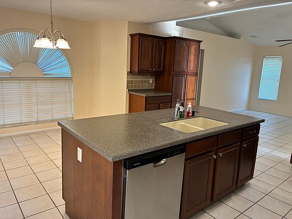 Kitchen island and area for kitchen table.