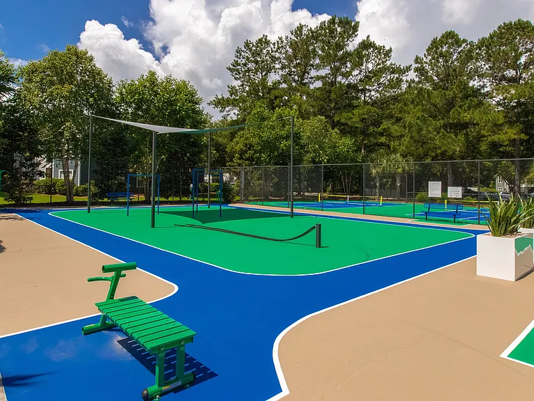 The Outdoor Fitzone invites residents to stay active amid the beauty of nature, offering a tranquil courtyard equipped with state-of-the-art exercise gear.