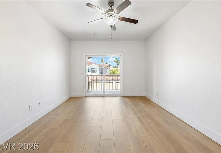 Primary bedroom oversees private porch