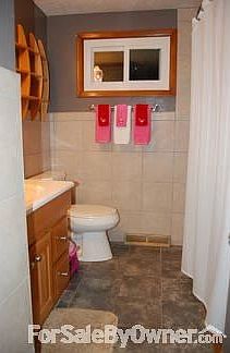 Upstairs BR
						:
						Ceramic Tile on floor and walls, New tub, new vanity, new window