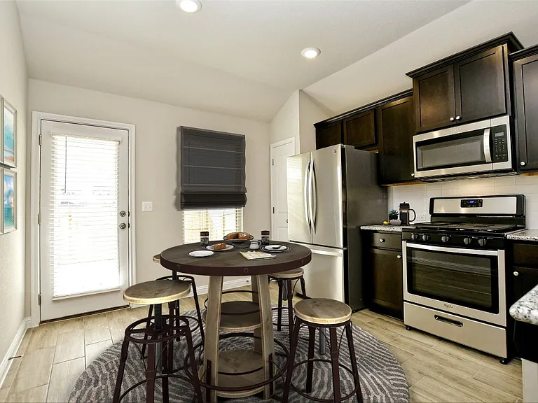 8205 Cottage Rose Dr — Photo 10