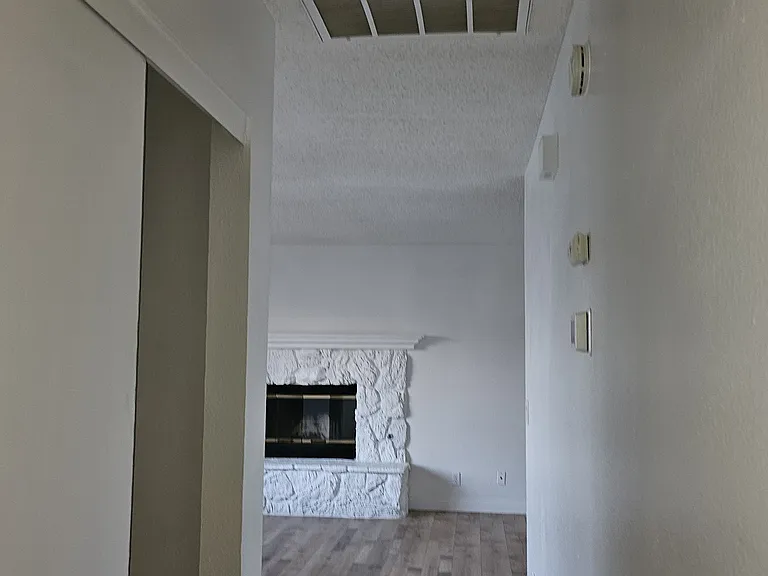 Hallway from bedrooms to Living room