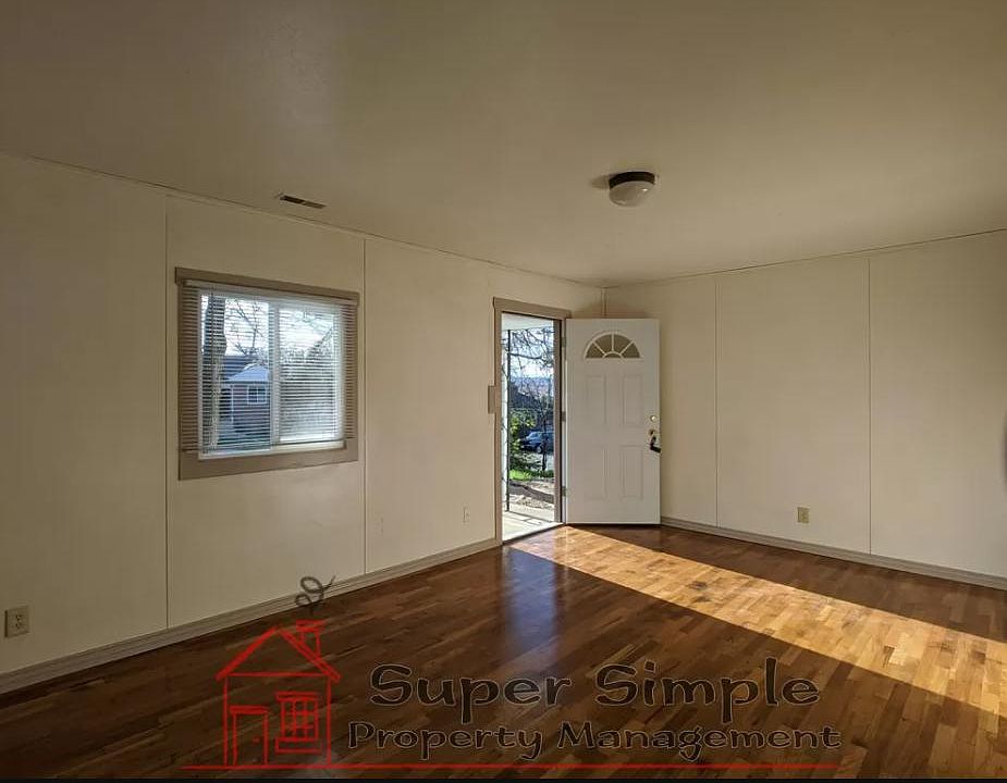 Refinished original hardwood floors in living room