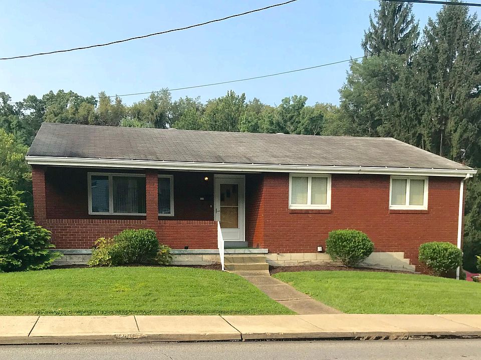 Front; Entrance to driveway on Tenth Street