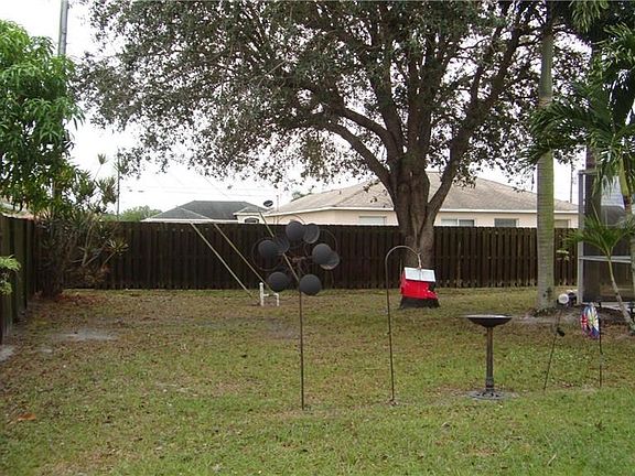 Plenty of room in the back yard. Entire back fenced in with 6' privacy fence.
