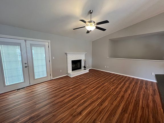 Family room with French doors that open to back patio.
