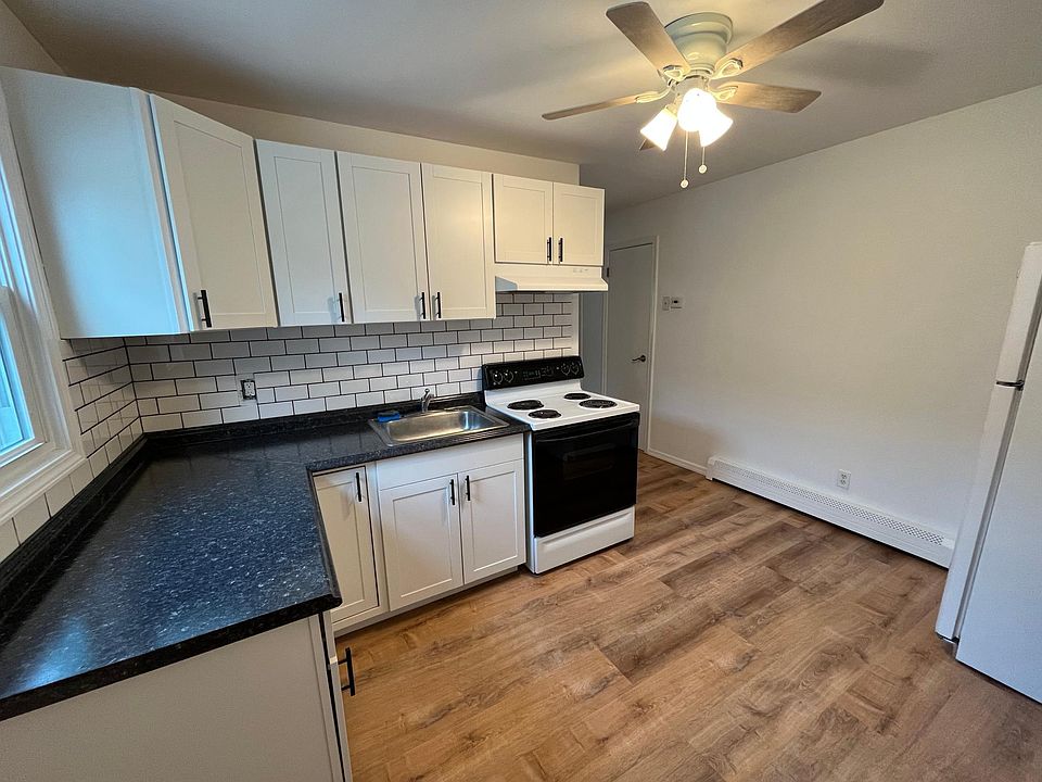 New kitchen cabinets, back-splash, flooring and fan.
