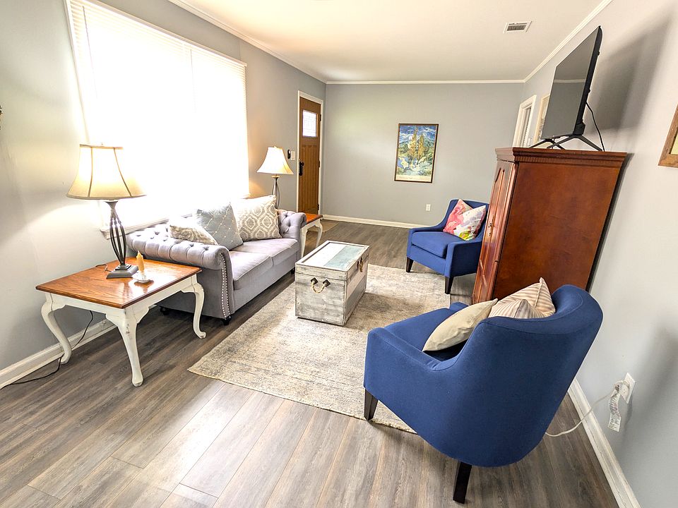 Bright and cozy living room with smart TV