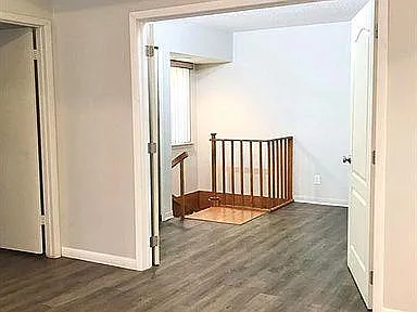 The stairway leading down to the bonus rooms and 3rd bath.