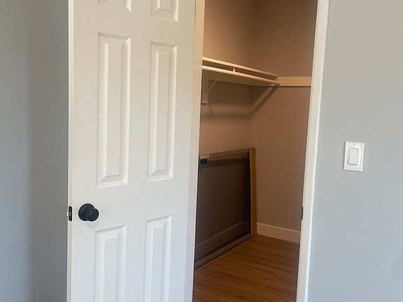 WALK IN CLOSET IN BEDROOM