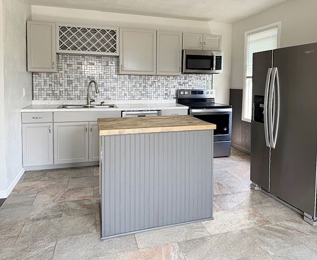 upgraded kitchen with new appliances.