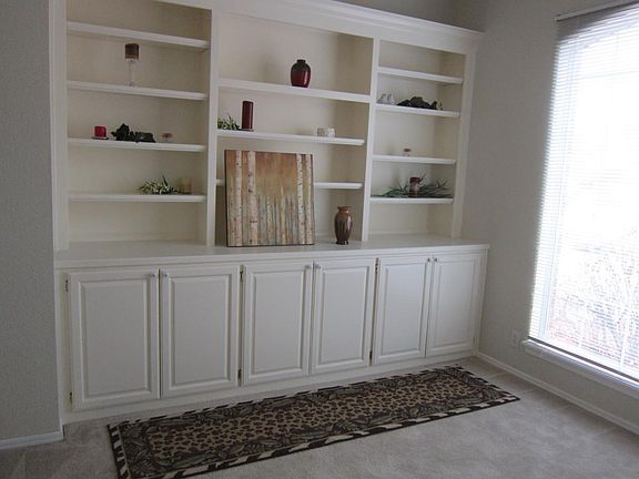 Built in bookcases & cabinets in flex room