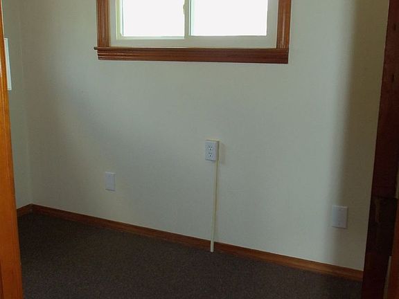 Storage-pantry area off back entry provides extra space for