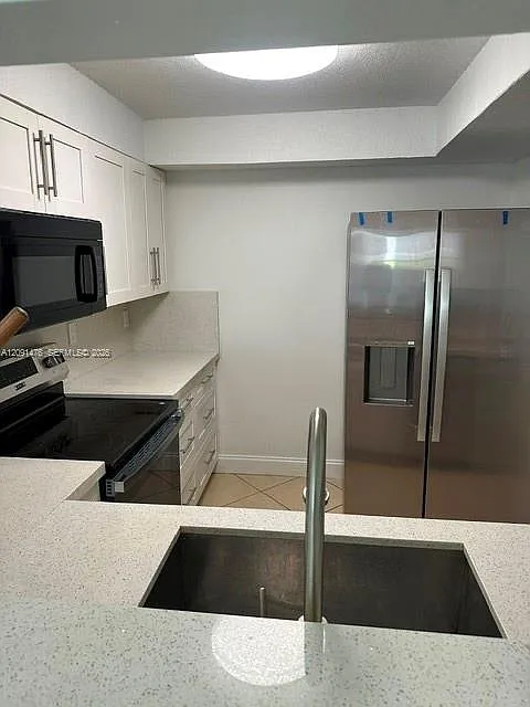 Westbird Village Condo — Photo 2