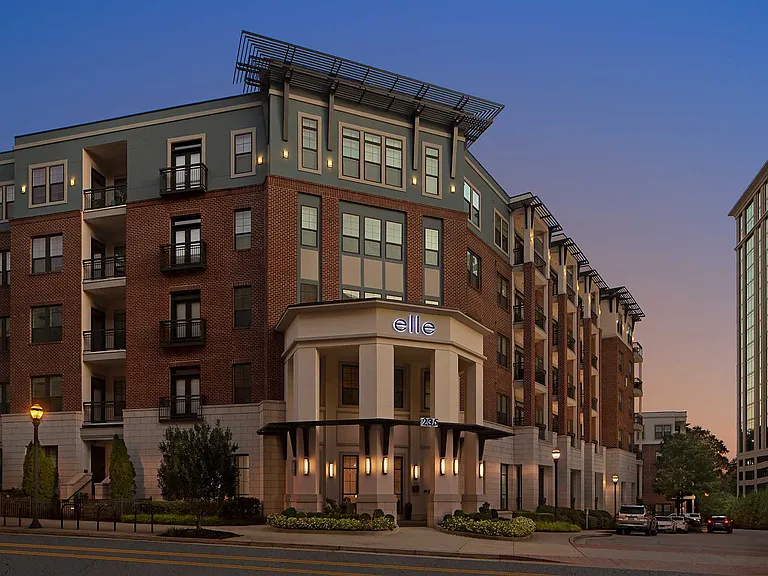 Dusk shot of building exterior with entrance