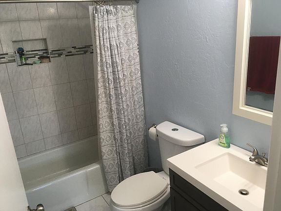 Two full baths with dual flush toilets.