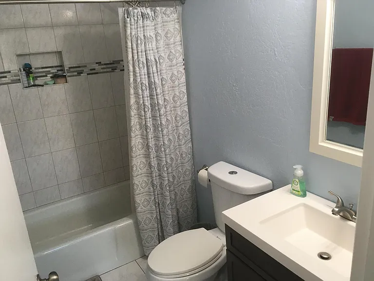 Two full baths with dual flush toilets.