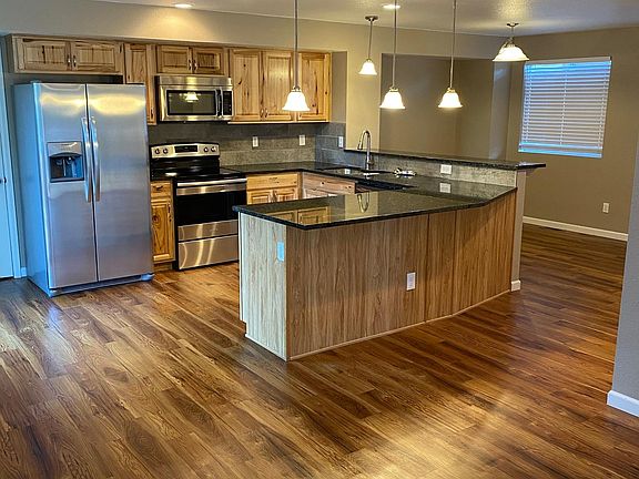 open concept kitchen, dinning, and family room