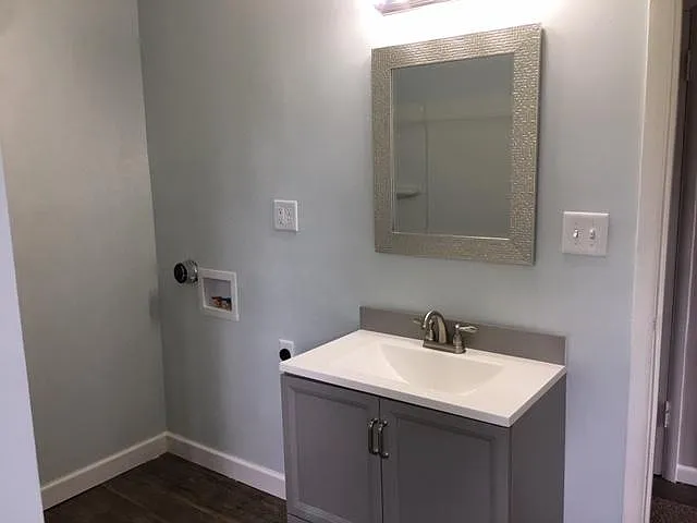 There is now a stacked washer and dryer in this corner. Picture was taken before it was installed.