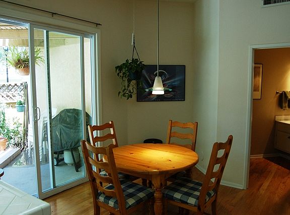 Dining area that leads to the patio area plus the powder bathroom is off the living/dining area.