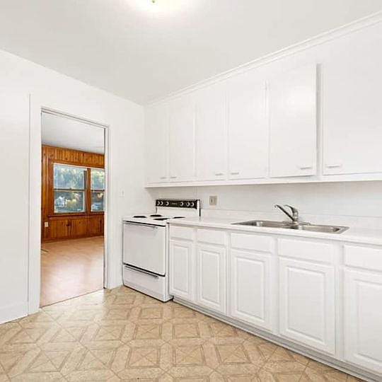Open Kitchen - Backdoor access to Patio