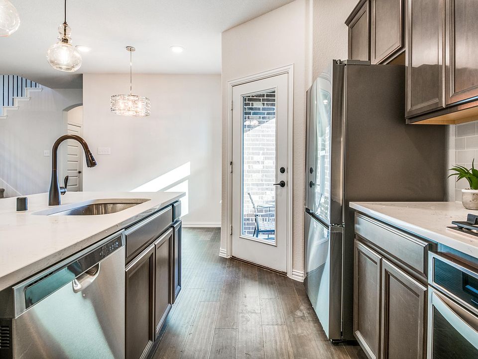 Executive living. New refrigerator. Loads of cooking space. Covered patio.