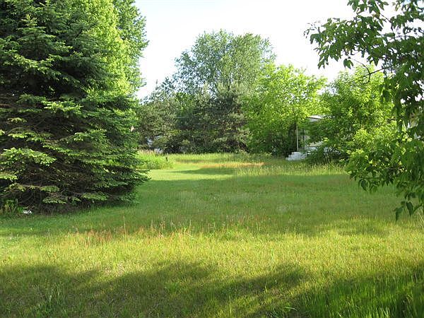 This lot in the county just north of Greenville has been approved for a Mobile home. Why pay lot rent when you can own your own land for less. Only $100 per month.   Wow, why pay rent?  We  will accept land contract terms as low a $500. down, payments are flexible, as low as $100. a month.   Wow, why pay rent?   We have several different locations in Montcalm Co.