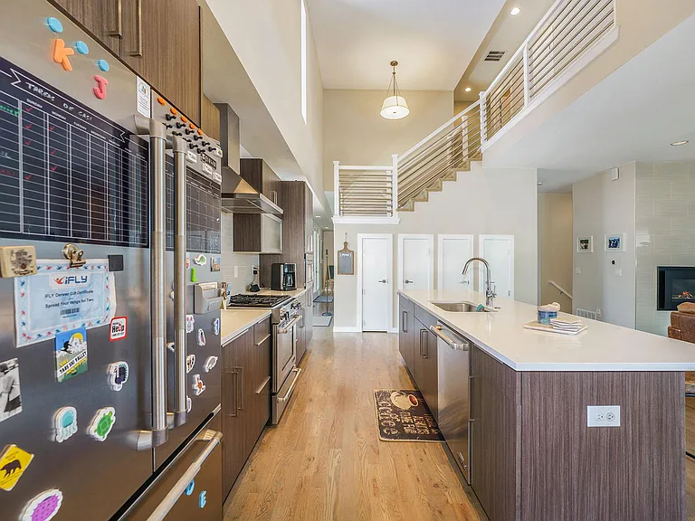 The living room is slightly shown on the right