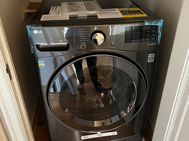 Washer / Dryer combo unit in the closet. It takes around 3-hr to complete the full cycle