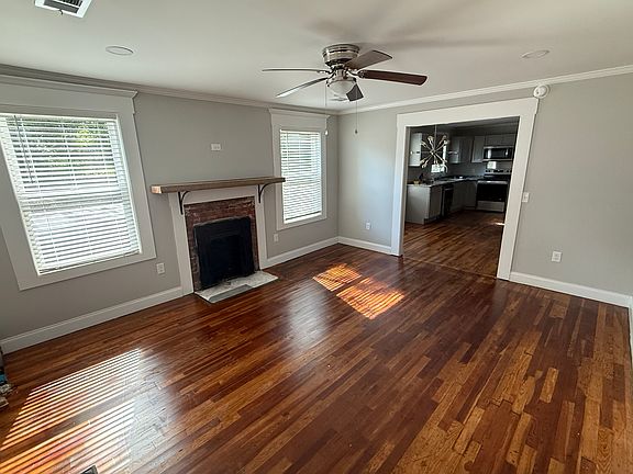While the fireplace is not operational, it was part of the original home. We have added some modern touches to include power for entertainment above the mantle.