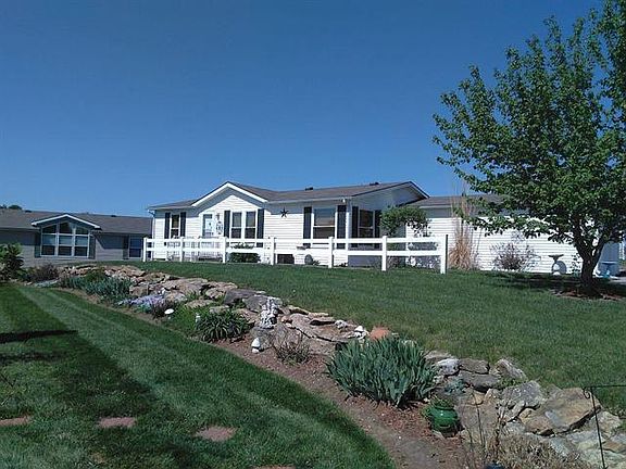 5th image of 936 NE White Oaks Ln