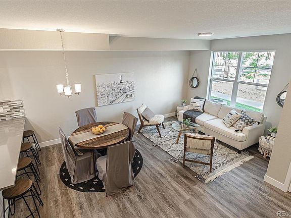 Spacious living room and dining room area for relaxing and entertaining bird-eye view